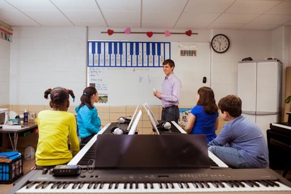 Piano Labs Instructor Hugh Little with Woods Lake Elementary School Students
